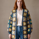 Daisy Balloon Sleeve Long Cardigan in teal worn open over a cream top with blue jeans, full sleeves gathered into ribbed cuffs - handmade by Ana Chic