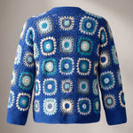 Back of the Mosaic Cardigan in cobalt and aqua, ringed puff-stitch squares in sea blues and cream on cobalt - handmade by Ana Chic