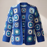 Front of the Mosaic Cardigan in cobalt and aqua, ringed puff-stitch squares in sea blues and cream on cobalt - handmade by Ana Chic
