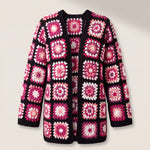 Front of the Long Cardigan in black and pink, crocheted squares in fuchsia, blush, plum and white on black - handmade by Ana Chic