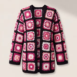 Front of the Long Cardigan in black and pink, crocheted squares in fuchsia, blush, plum and white on black - handmade by Ana Chic