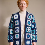 Long Cardigan in navy and turquoise worn open over an ecru roll-neck with ecru barrel jeans - handmade by Ana Chic