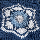 Macro of a hand-crocheted square with six white shell fans inside a hexagon on navy, Sampler Long Cardigan