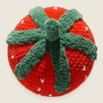 Velvet Strawberry Pillow — handmade velvet crochet amigurumi by Ana Chic, styled view